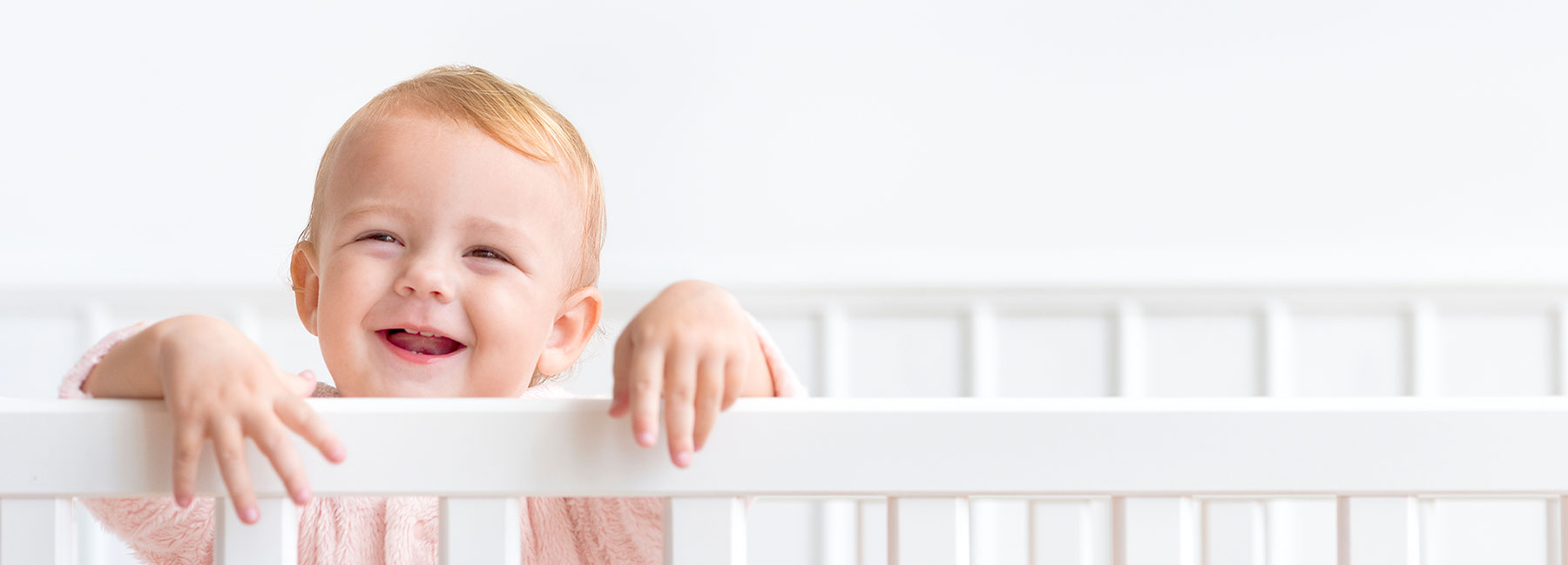 Enfant dans son berceau